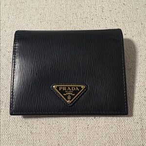 Prada Black Textured Unisex Leather BiFold Wallet. NWOT. No callouts